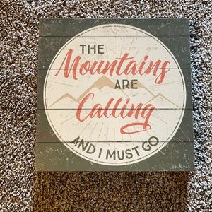 The Mountains Are Calling and I Must Go sign